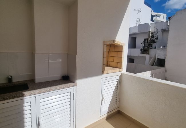 Appartement à Quarteira - T2 INFANTE 101 A/C MODERNO WI-FI GARAGEM 50M PRAIA